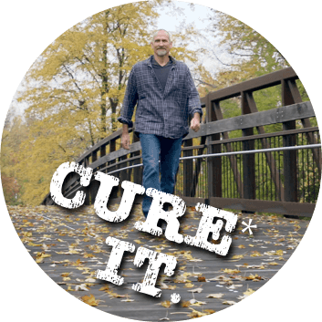 Rick, a patient who took MAVYRET, walking in a park.